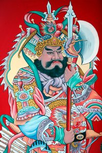 Hoi Tuong Te Nguoi Hoa Buddhist Chinese Temple. Guardian Figure Paintings on Gate. Phu Quoc. Vietnam